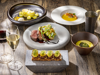 Full course lunch consisting of appetizer, soup, main course and dessert