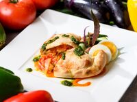 ポタジェール レコルト 南仏風夏野菜の煮込み～カルツォーネ仕立て～ 里山のサラダ添え