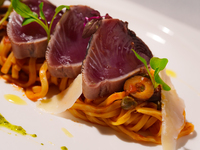Fresh tagliolini pasta with smoked bonito and delicious Miyakojima tomato puttanesca