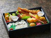 Fried shrimp and grilled salmon with cheese from a Western restaurant