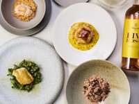 A luxurious French lunch featuring a 10-item appetizer platter and your choice of main course.