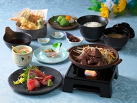 Grilled domestic beef on a ceramic plate and tempura set meal