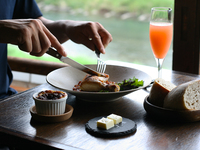 A luxurious lunch course to enjoy in a traditional Kyoto townhouse [served on the riverside terrace]