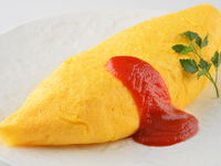 Omelet rice with tomato sauce