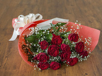 Festive Bouquet of 12 roses and gypsophila